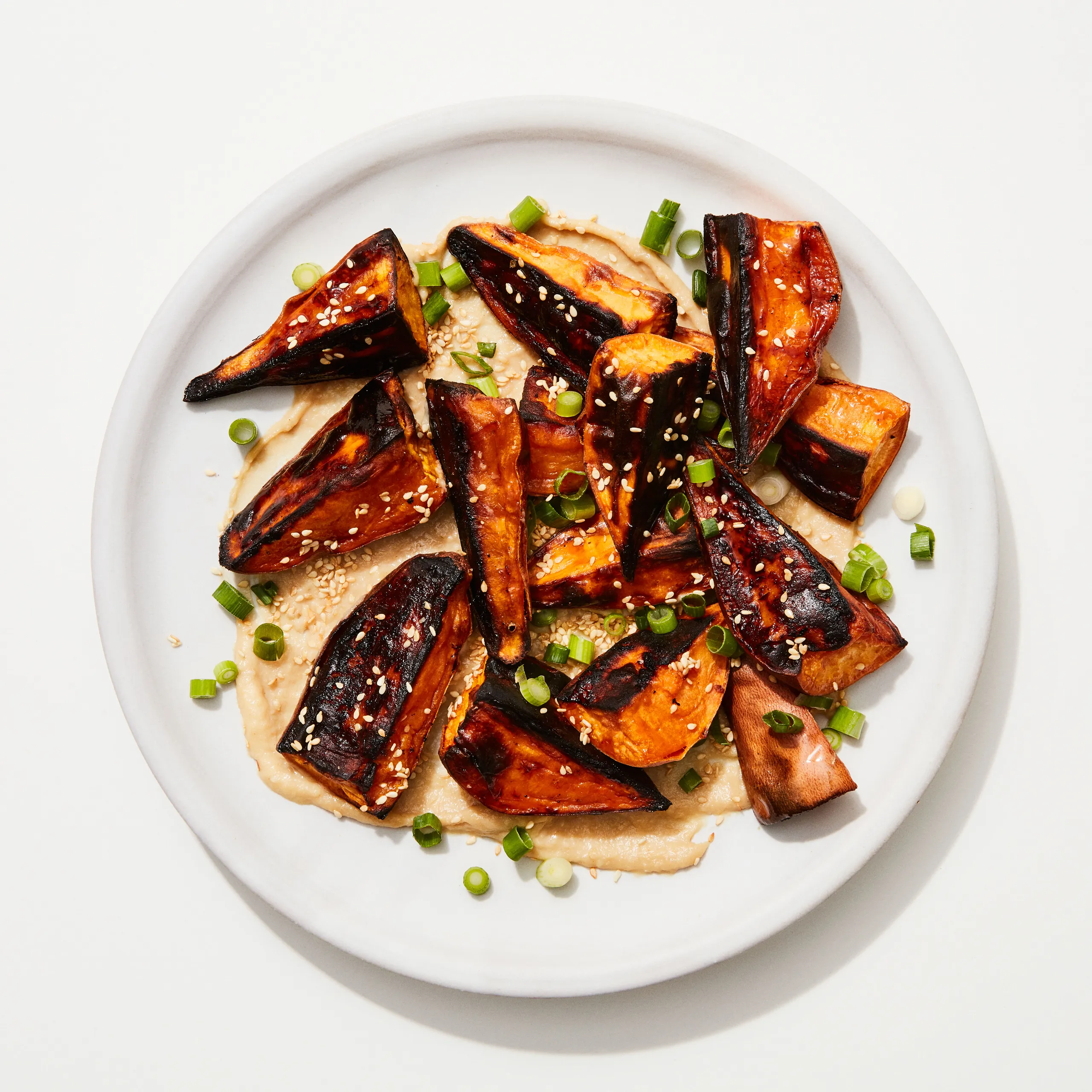 Miso-Tahini Glazed Roasted Sweet Potatoes with Kale