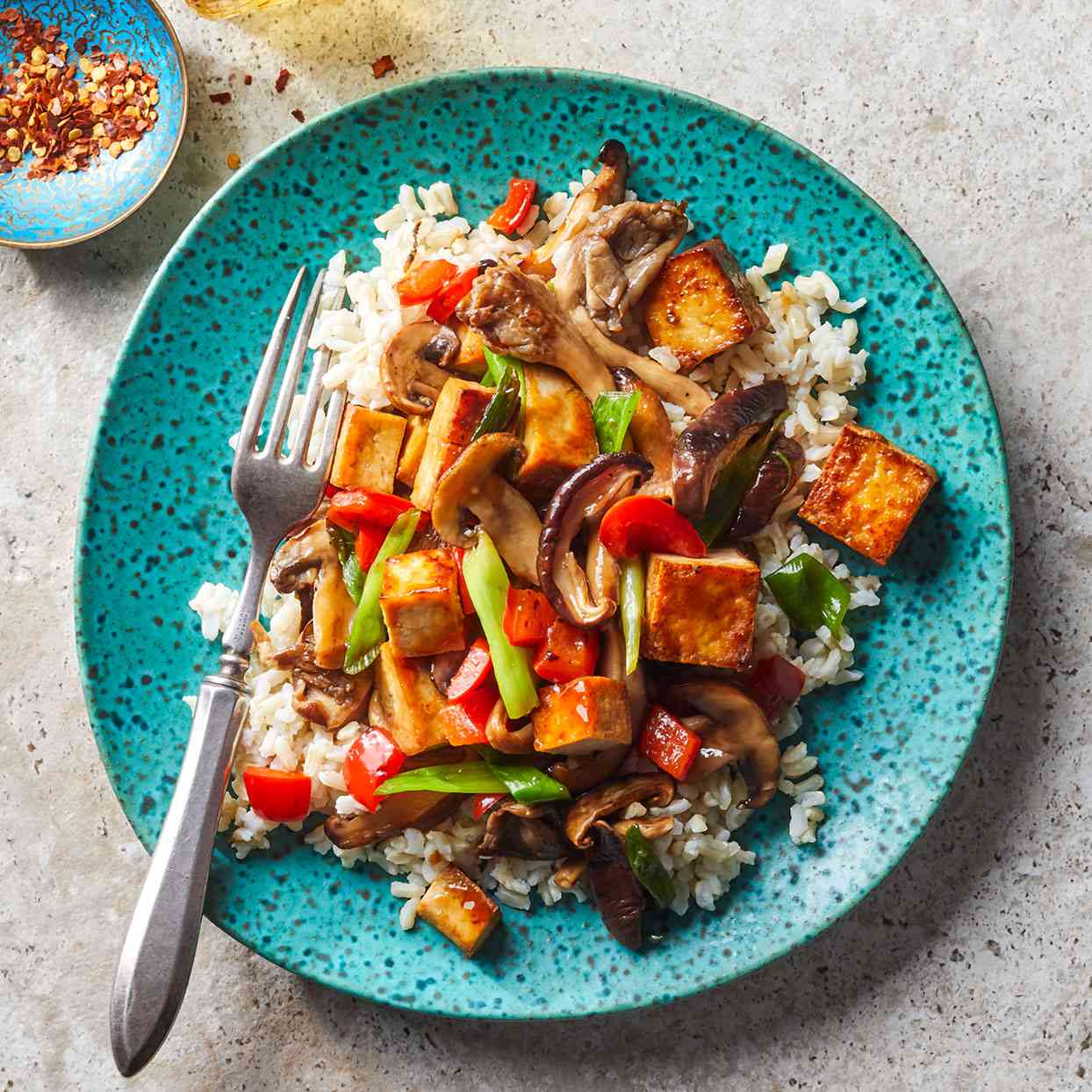 Asian-Inspired Tofu Stir-Fry with Mediterranean Couscous and Mexican Pico de Gallo