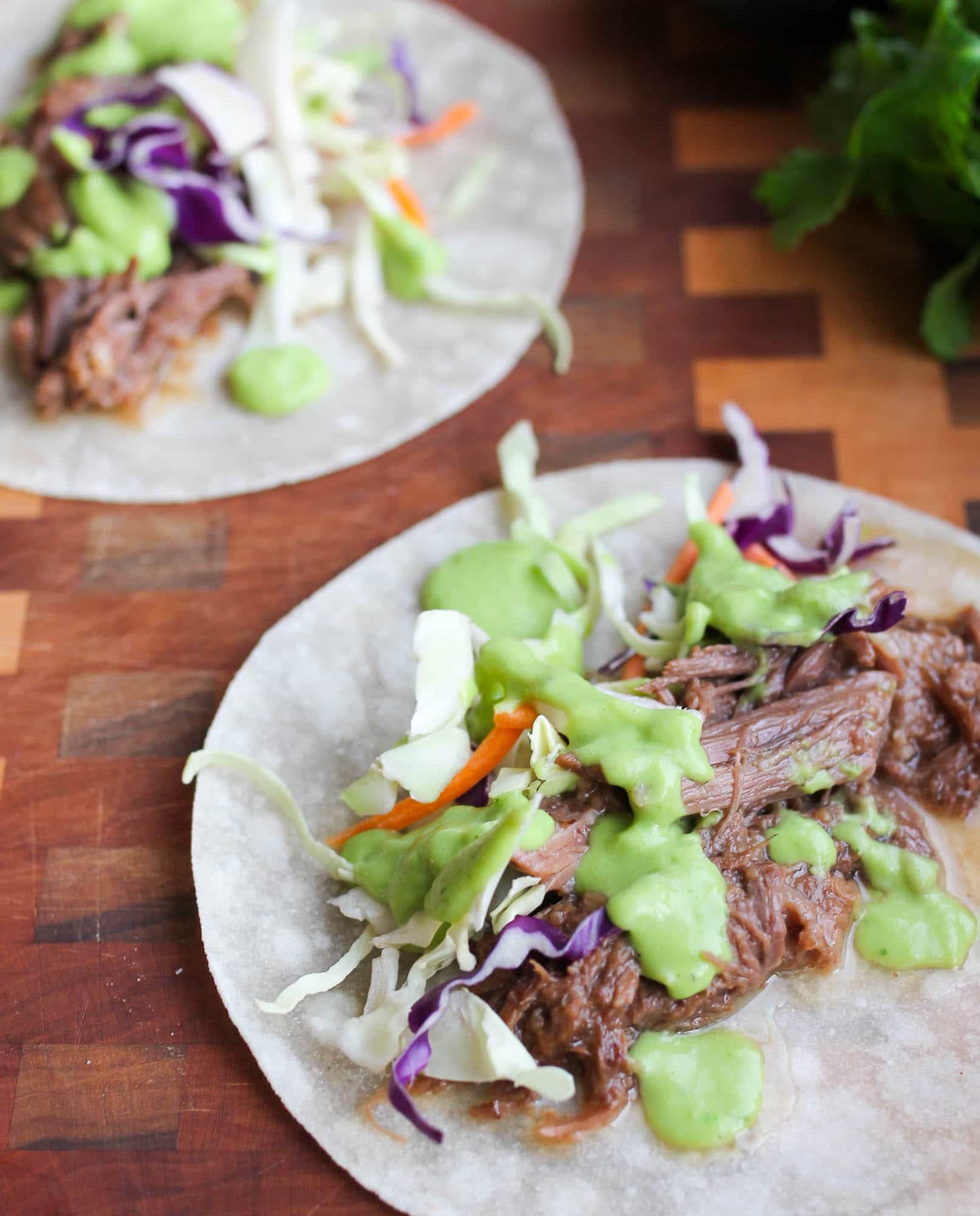 Texas-Style Mini Beef Tacos with Avocado Crema
