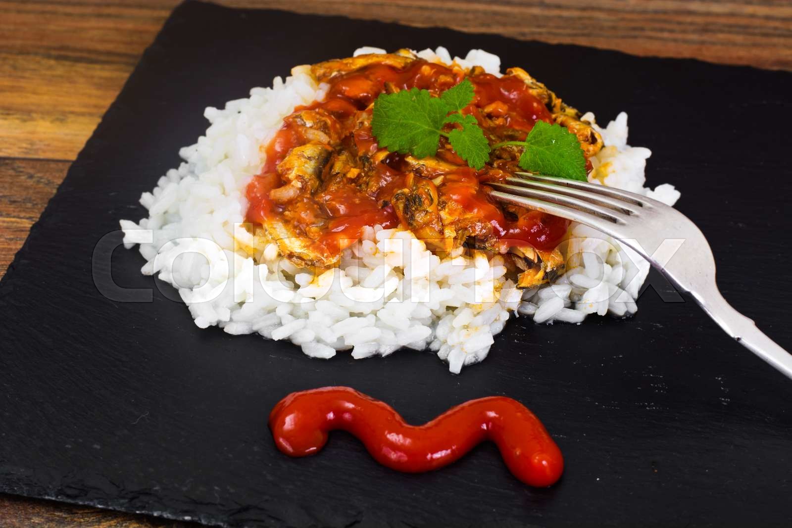 One-Pot Fish and Rice with Tomato Sauce