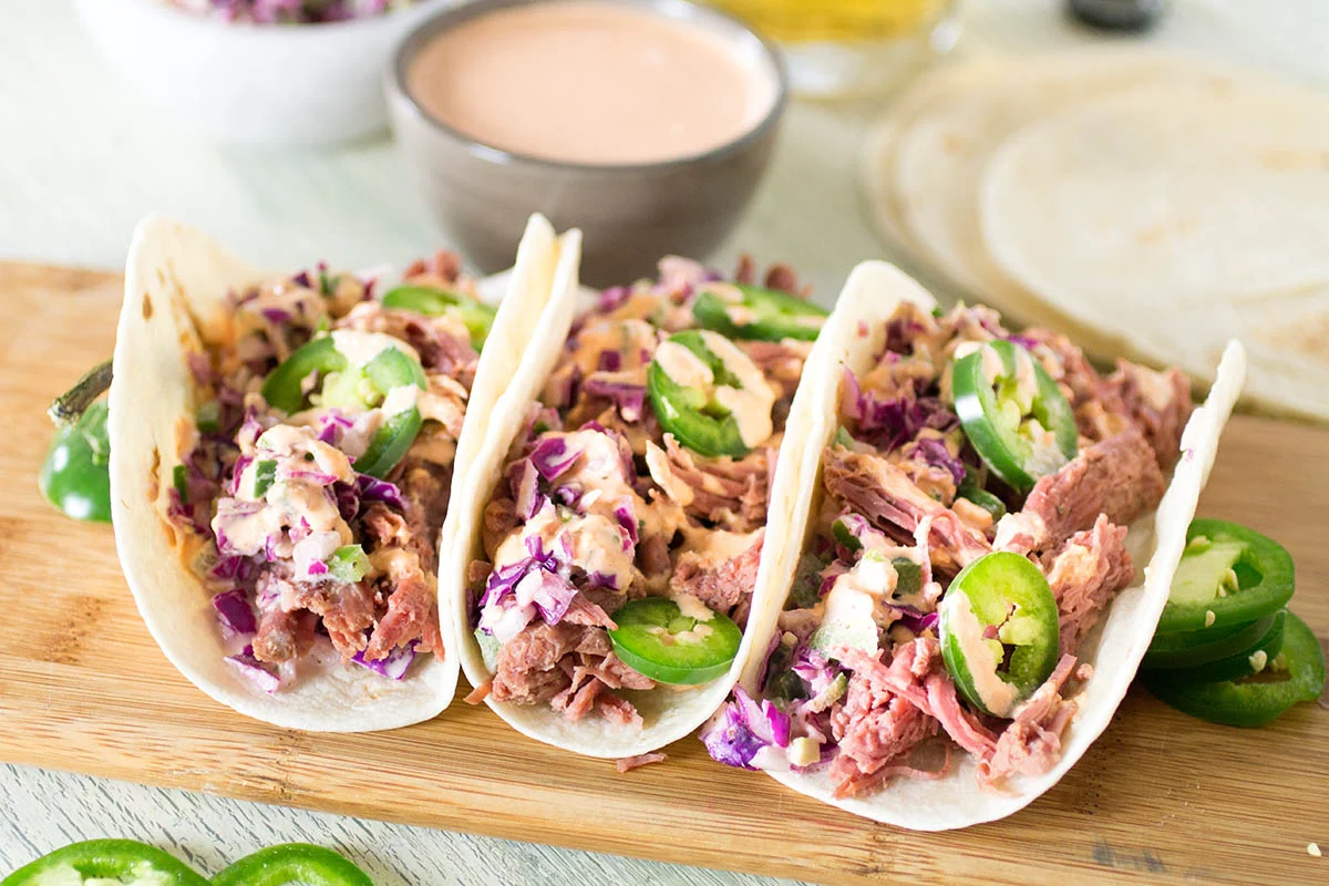 Ropa Vieja Beef Tacos with Cabbage Slaw