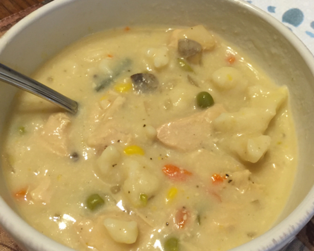 Slow-Cooked Chicken and Dumplings with Fresh Herbs