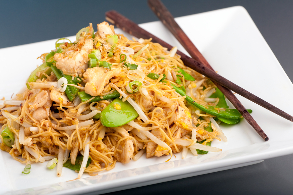 Quick Sesame-Ginger Chicken Stir-Fry with Snap Peas and Rice Noodles