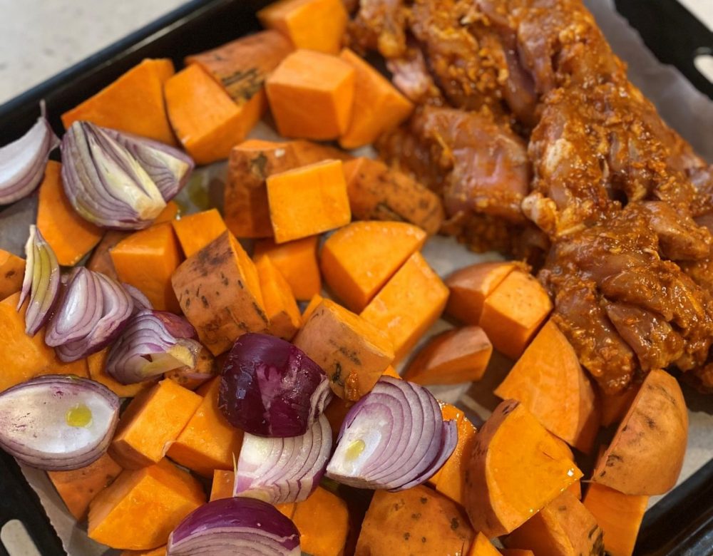 Harissa-Spiced Chicken Thighs with Sweet Potatoes
