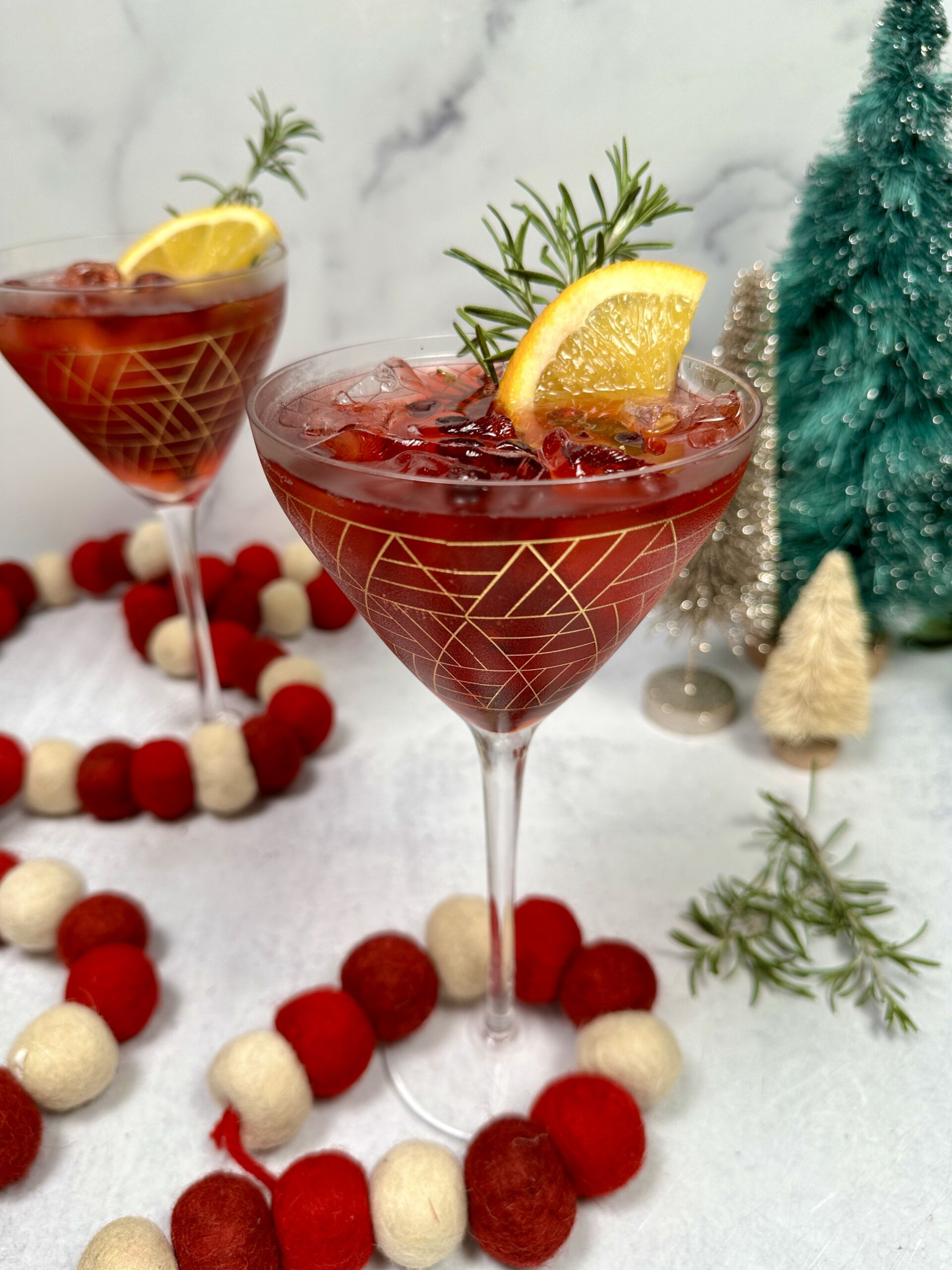 Pomegranate-Infused Aperol Spritz with Fresh Citrus