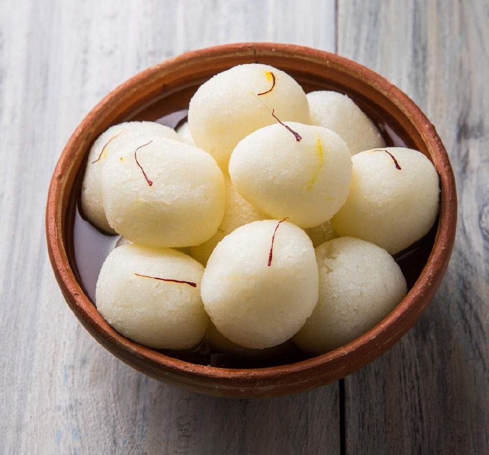 Roshogolla in Cardamom-Sweetened Syrup