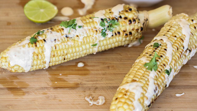 Cajun-Style Grilled Corn with Lime Crema