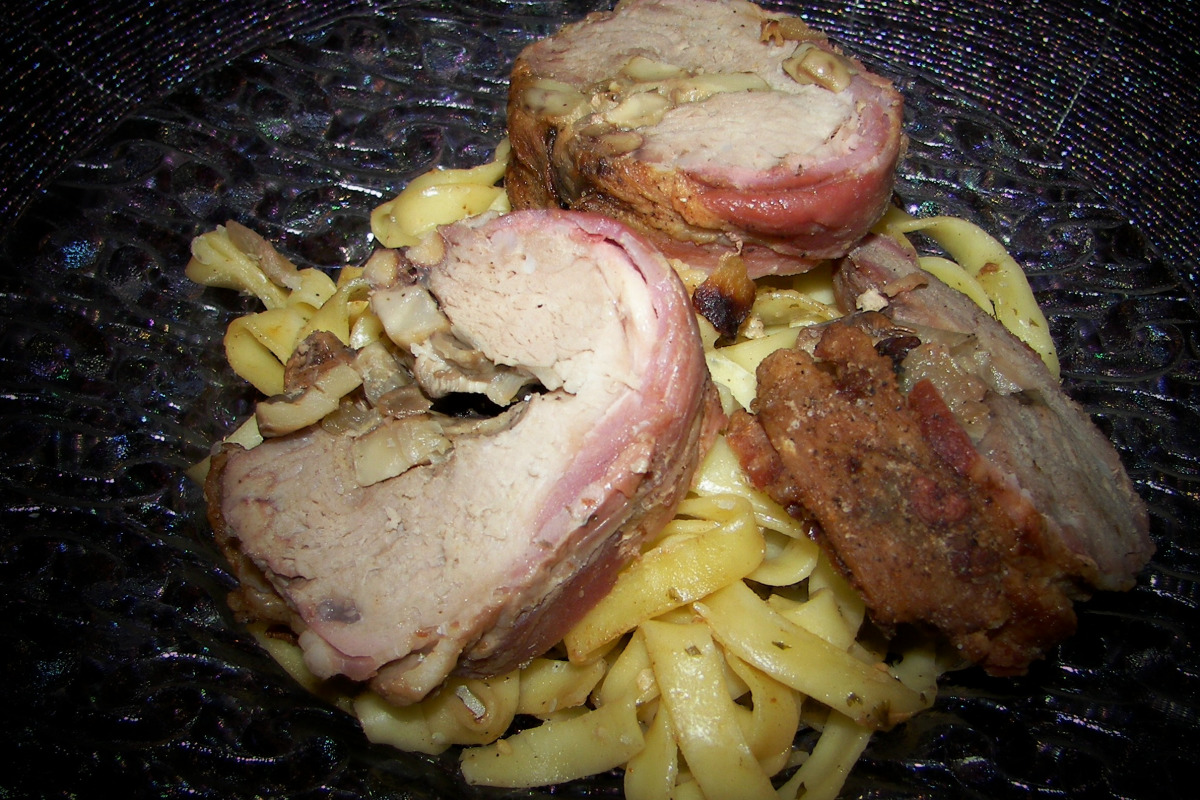 Bacon-Wrapped Pork Tenderloin with Mushroom Sauce