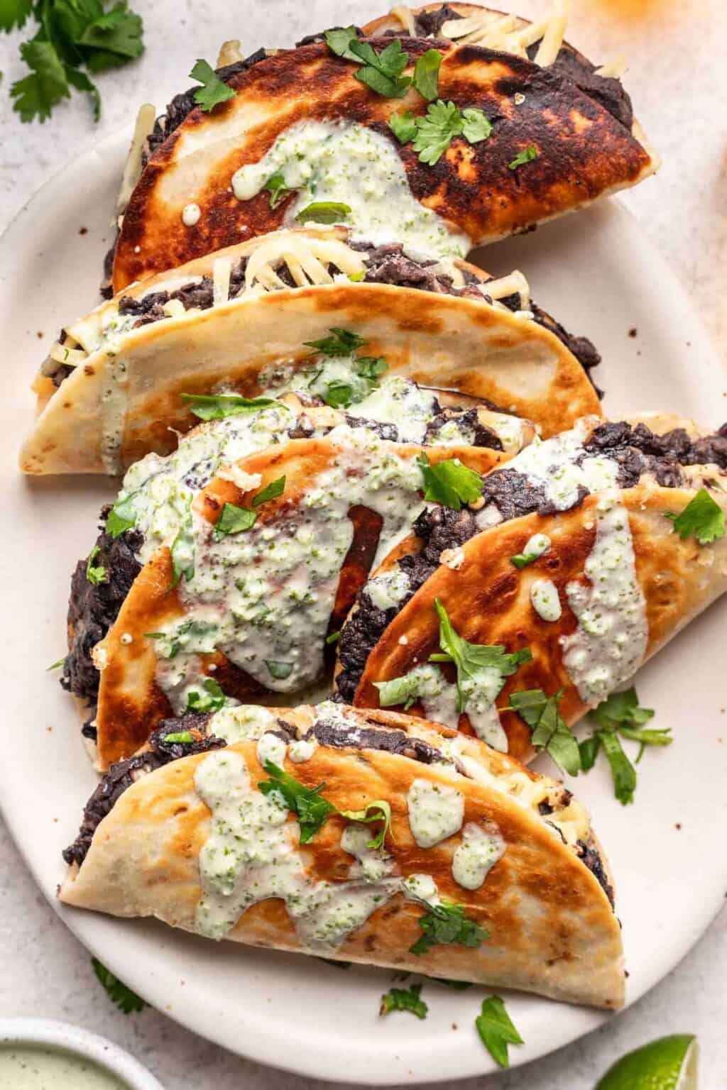 Crispy Refried Bean Tacos with Pickled Onions and Avocado