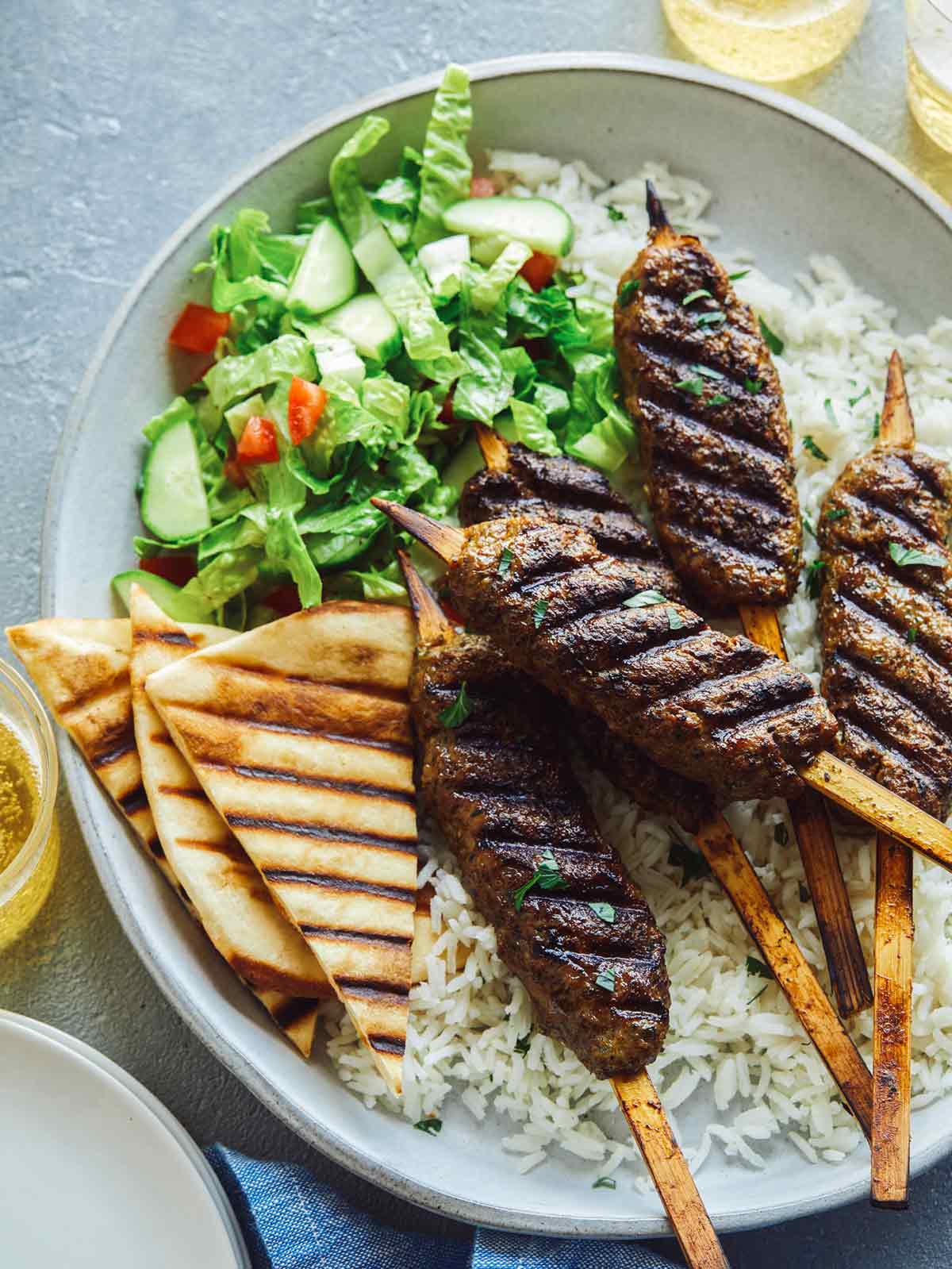 Herb-Crusted Lamb Kofta with Cumin-Spiced Rice