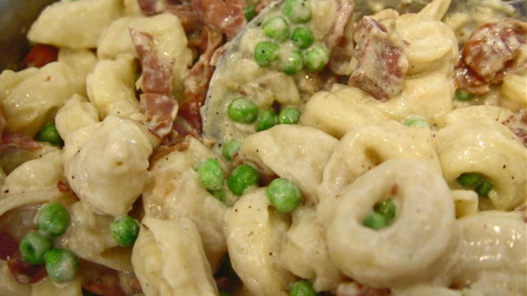 Herb-Infused Lemon Butter Pasta with Peas and Prosciutto