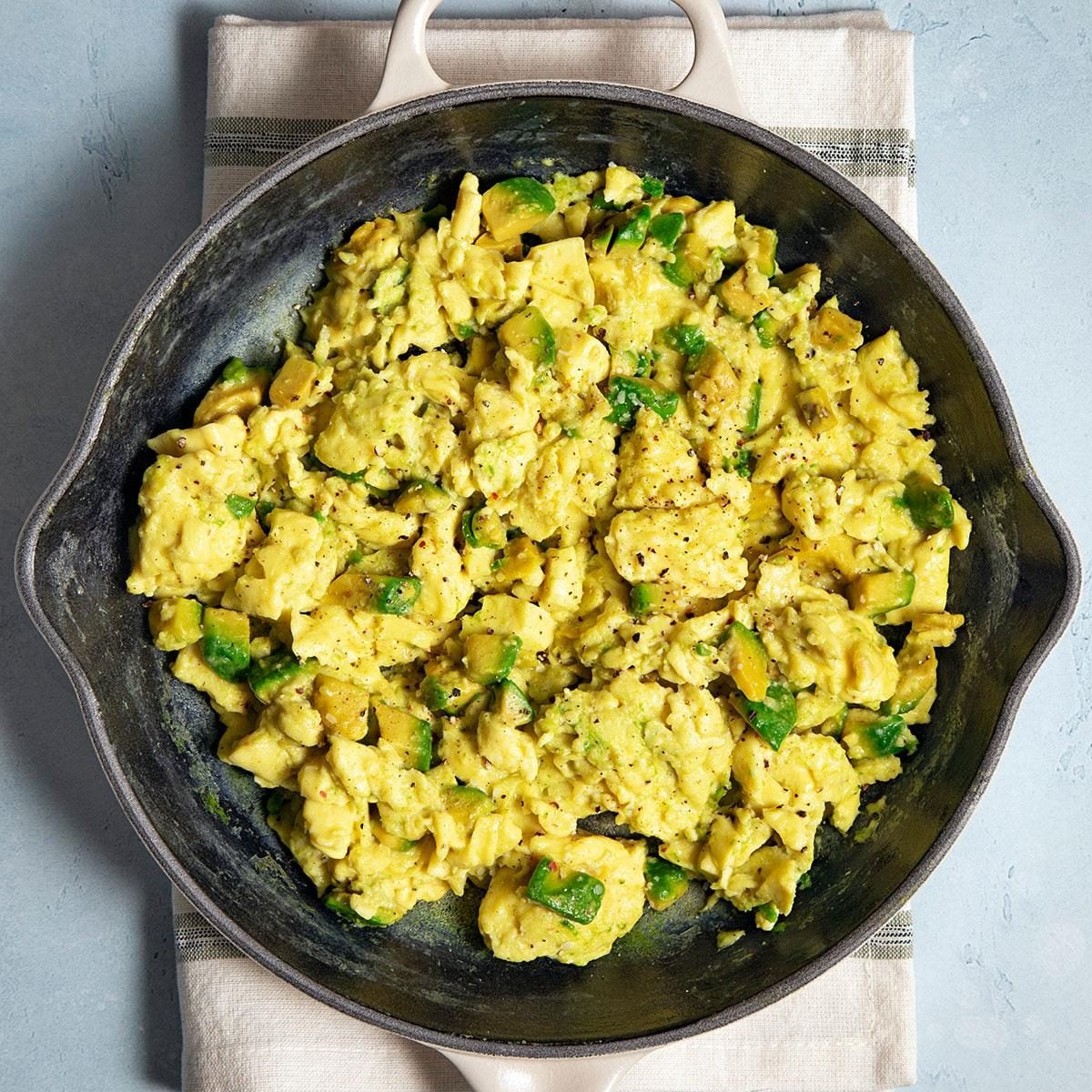 Savory Avocado and Herb Scrambled Eggs with Crispy Bacon