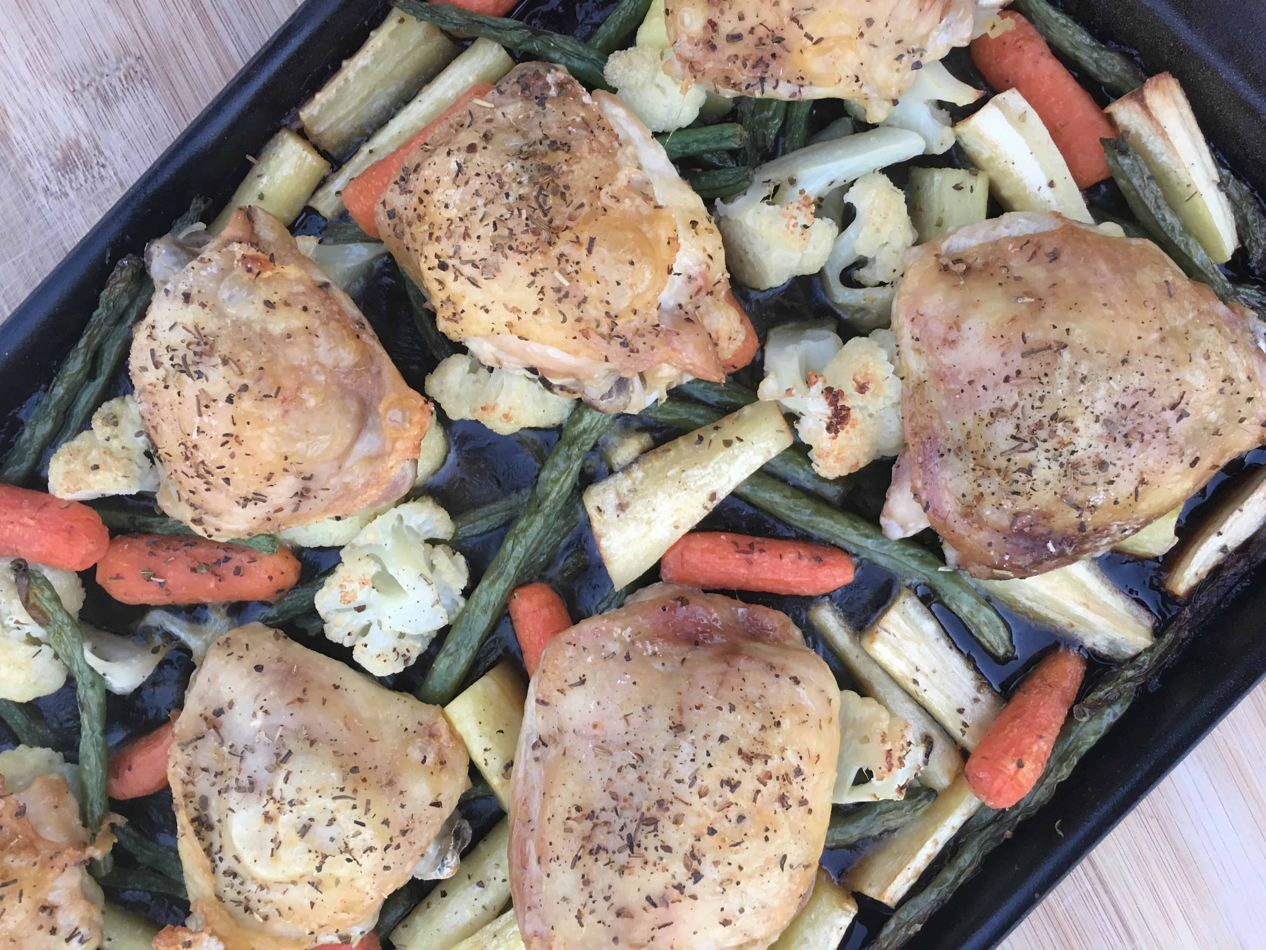 Herb-Roasted Chicken Thighs with Lemon-Dusted Vegetables