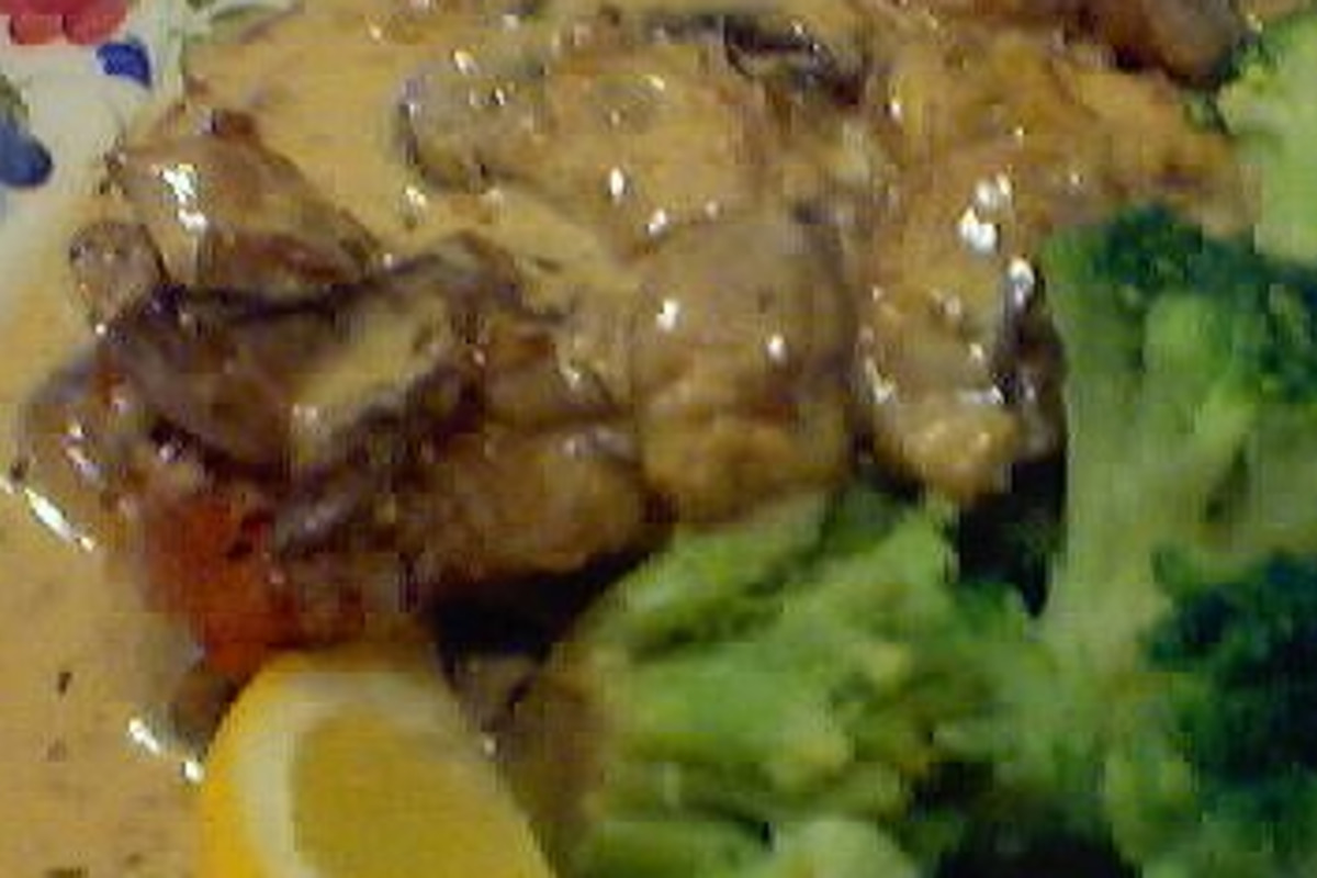 Bacon-Infused Pork Chops with Mushroom Cream Sauce