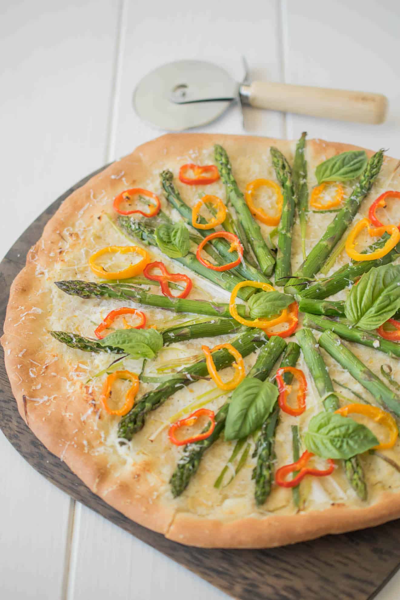Herb-Infused Spring Vegetable Pizza with Lemon Zest