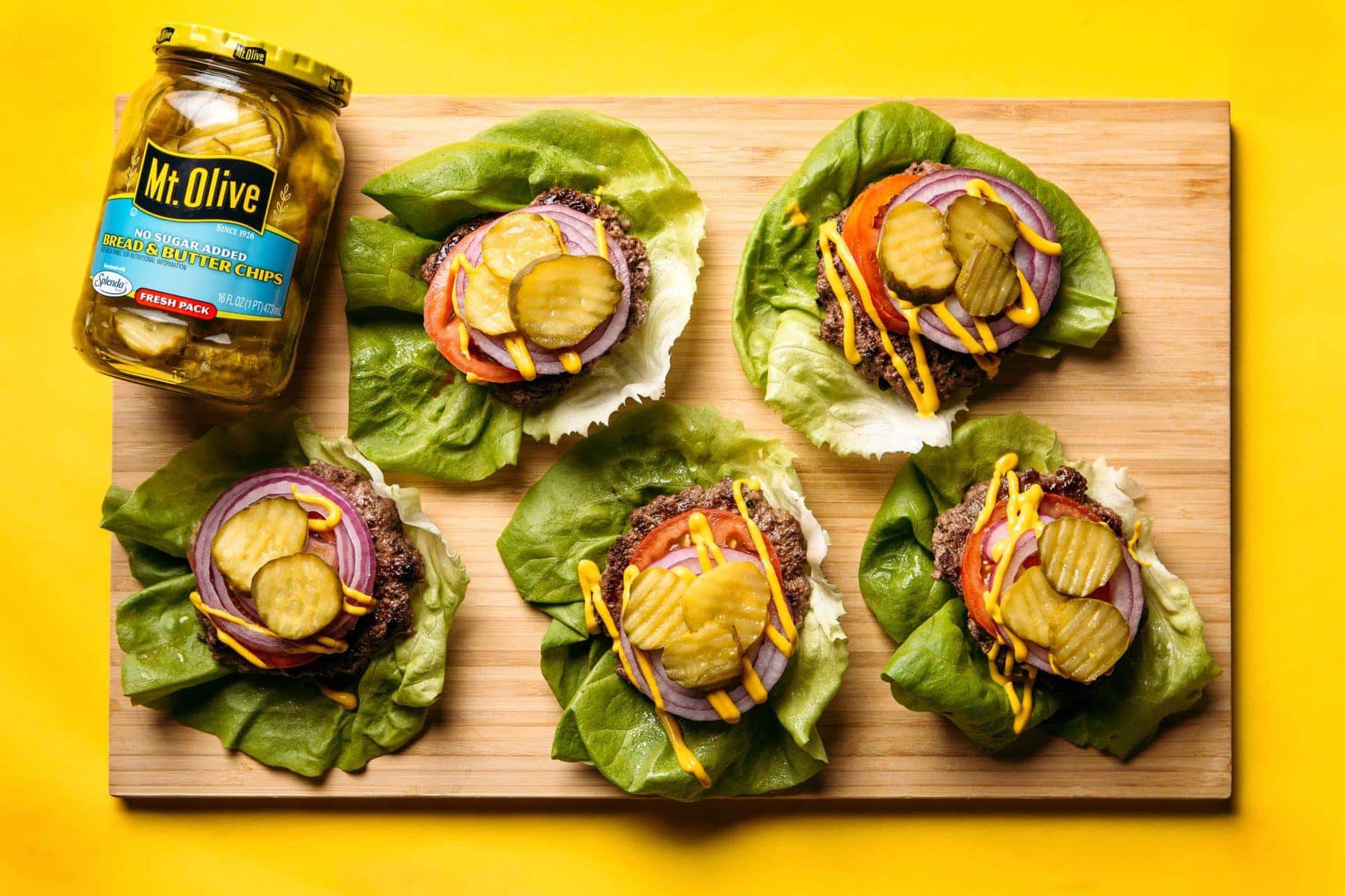 Lettuce-Wrapped Beef Burgers with Basil Olive Oil and Pickles
