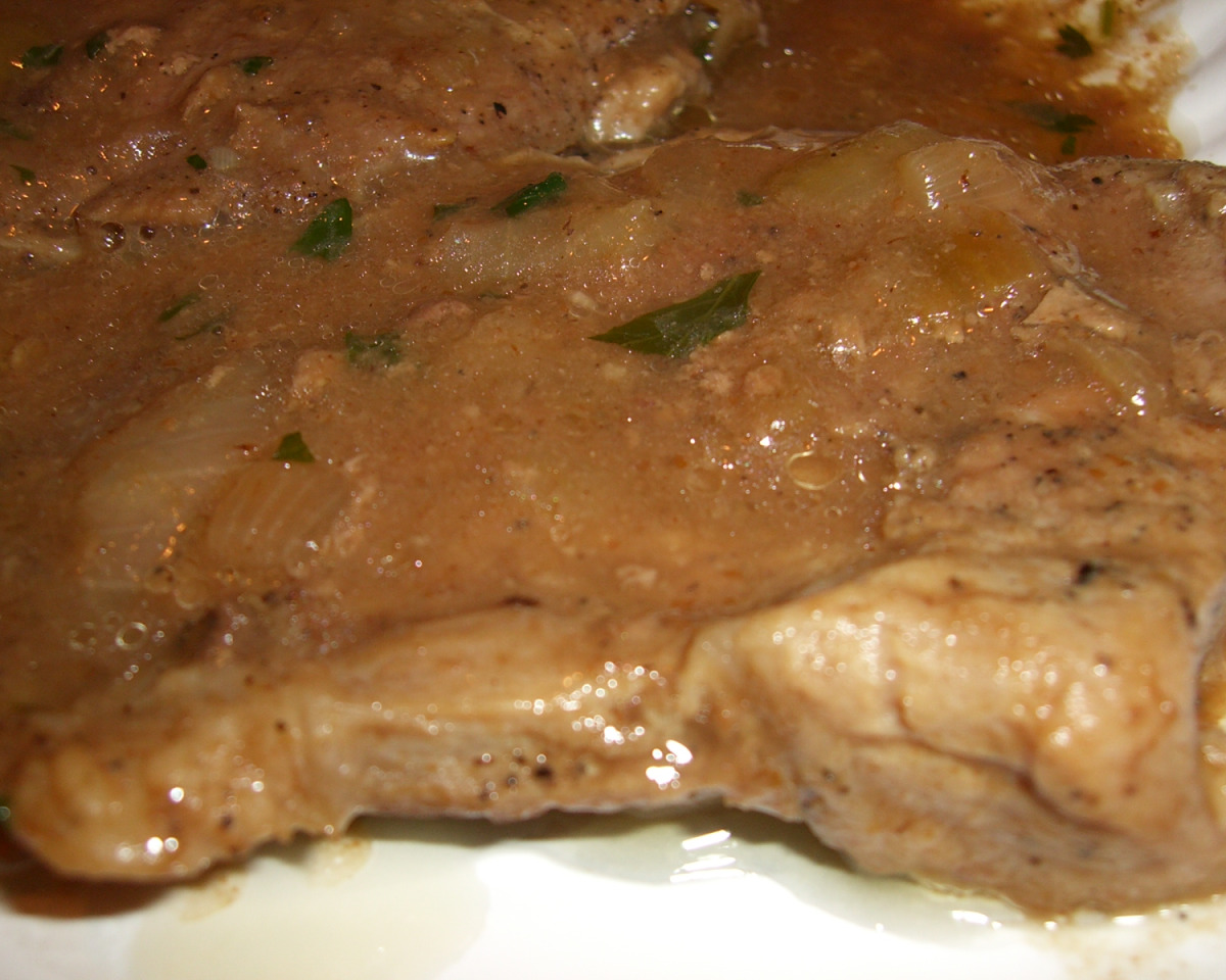 Cider-Braised Pork Chops with Apple and Onion Medley