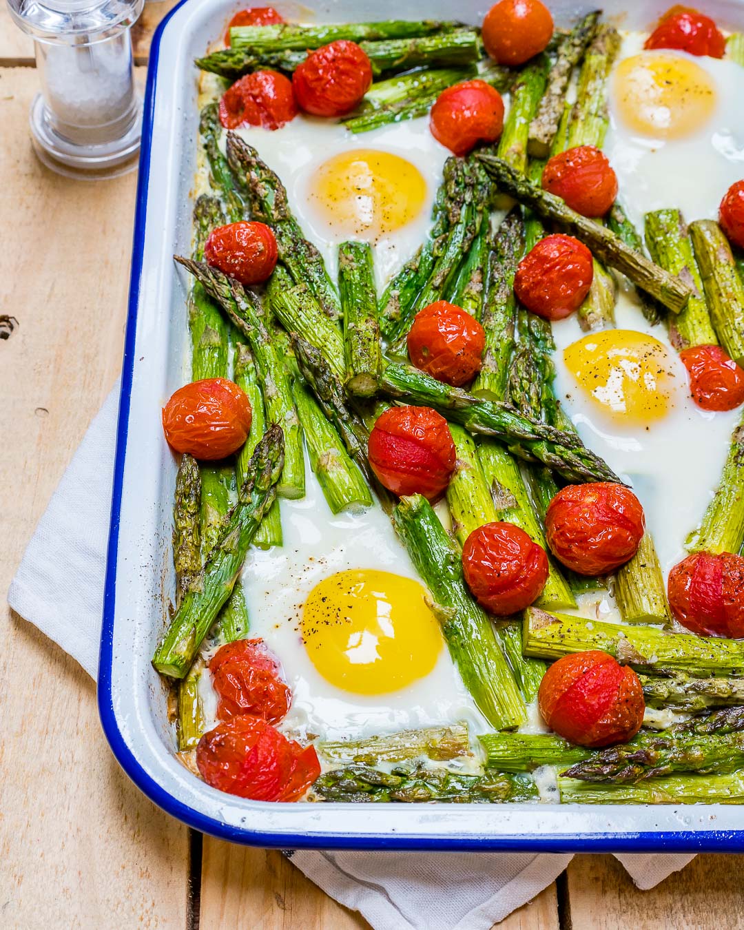 Herb-Infused Egg Bake with Roasted Asparagus and Tomatoes