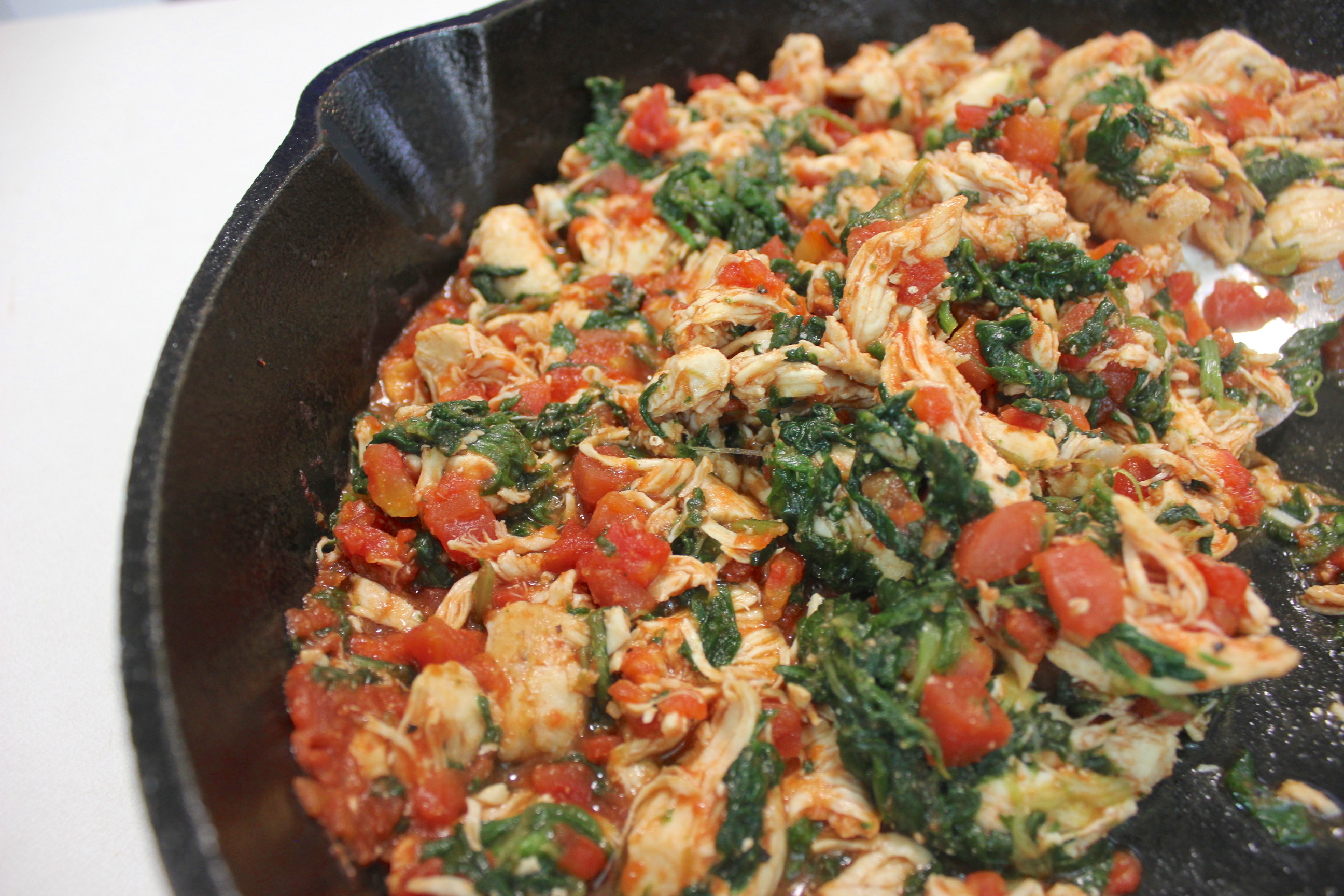 Stir-Fried Coconut Chicken with Spinach and Tomatoes