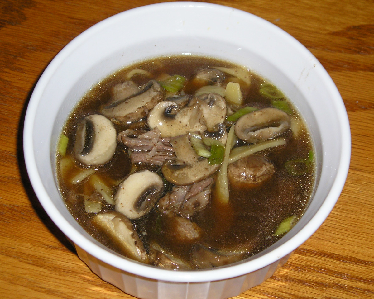 Slow-Cooked Beef Noodle Soup with Ginger and Scallions