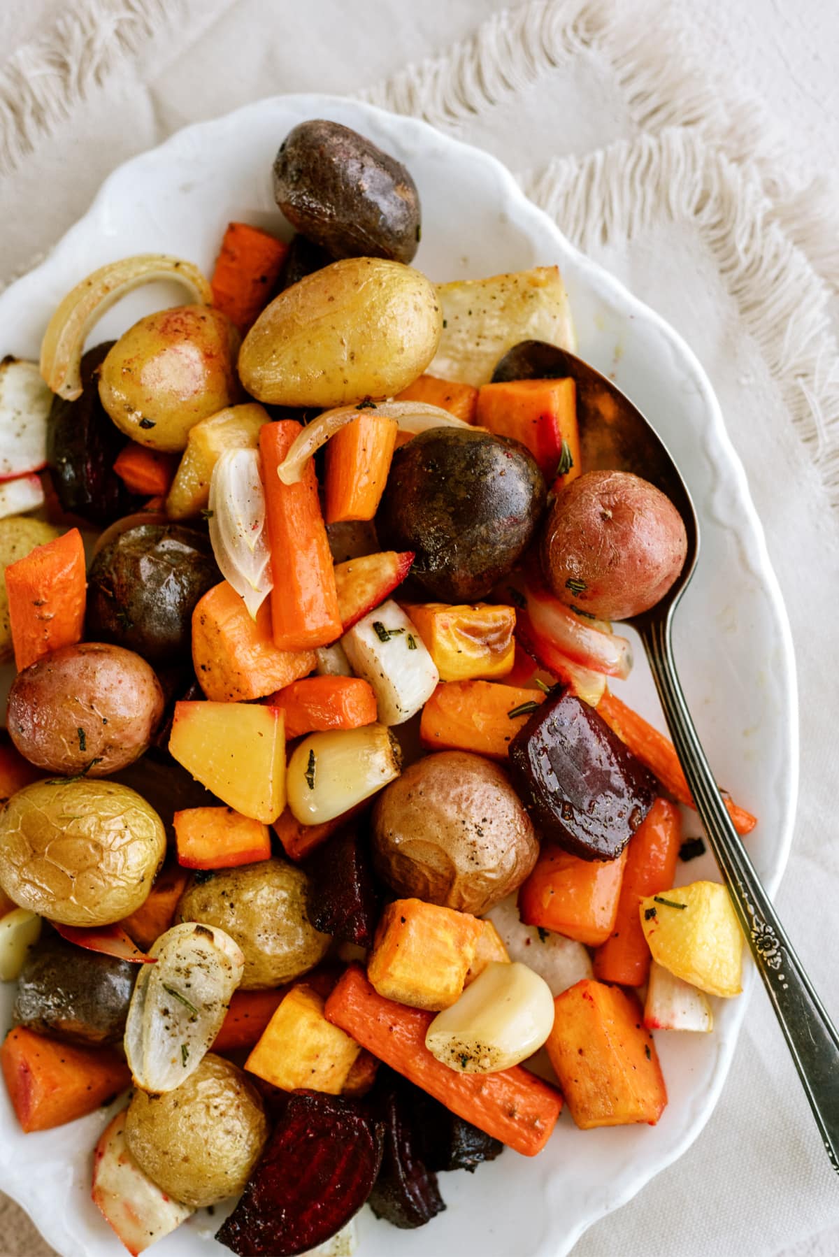 Pan-Seared Pork Tenderloin with Herb Butter and Roasted Root Vegetables