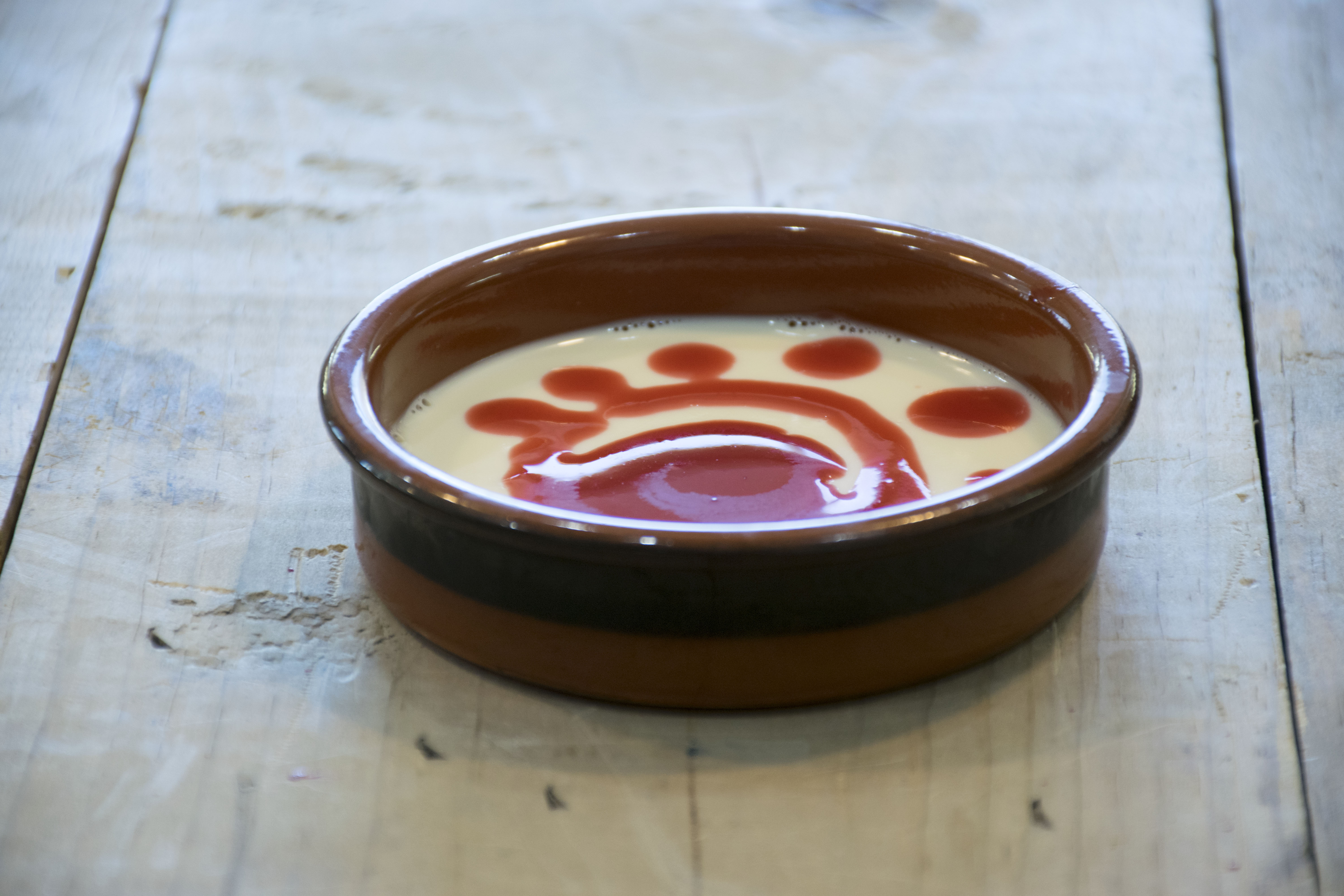 Citrus-Infused Coconut Panna Cotta with Raspberry Coulis