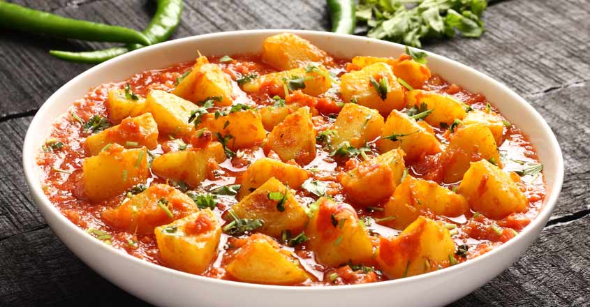Tomato-Based Potato Curry with Fresh Coriander