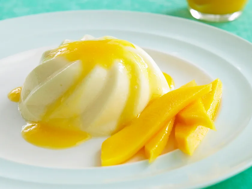 Rum-Soaked Coconut Panna Cotta with Mango Coulis