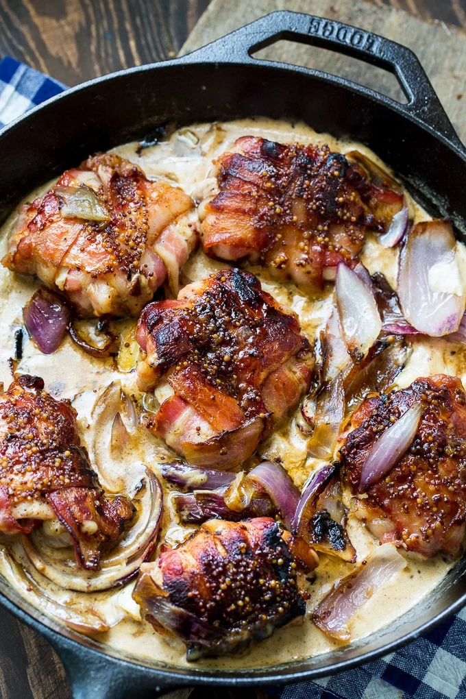 Bacon-Wrapped Chicken Thighs with Garlic Cream Sauce