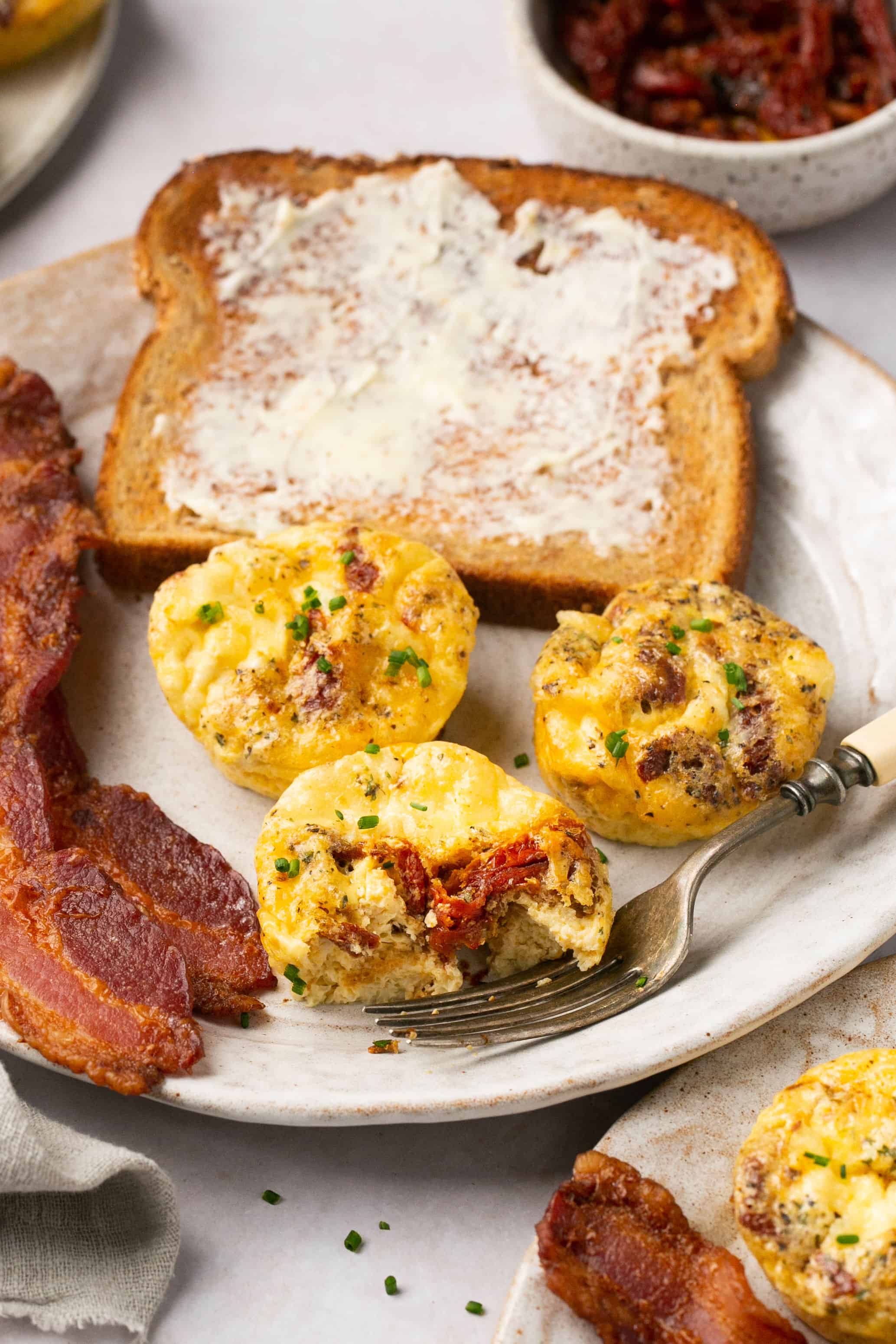 Cheesy Chive Egg Bites with Sun-Dried Tomatoes