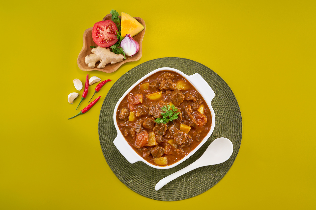 Slow-Cooked Beef and Tomato Stew with Fresh Herbs
