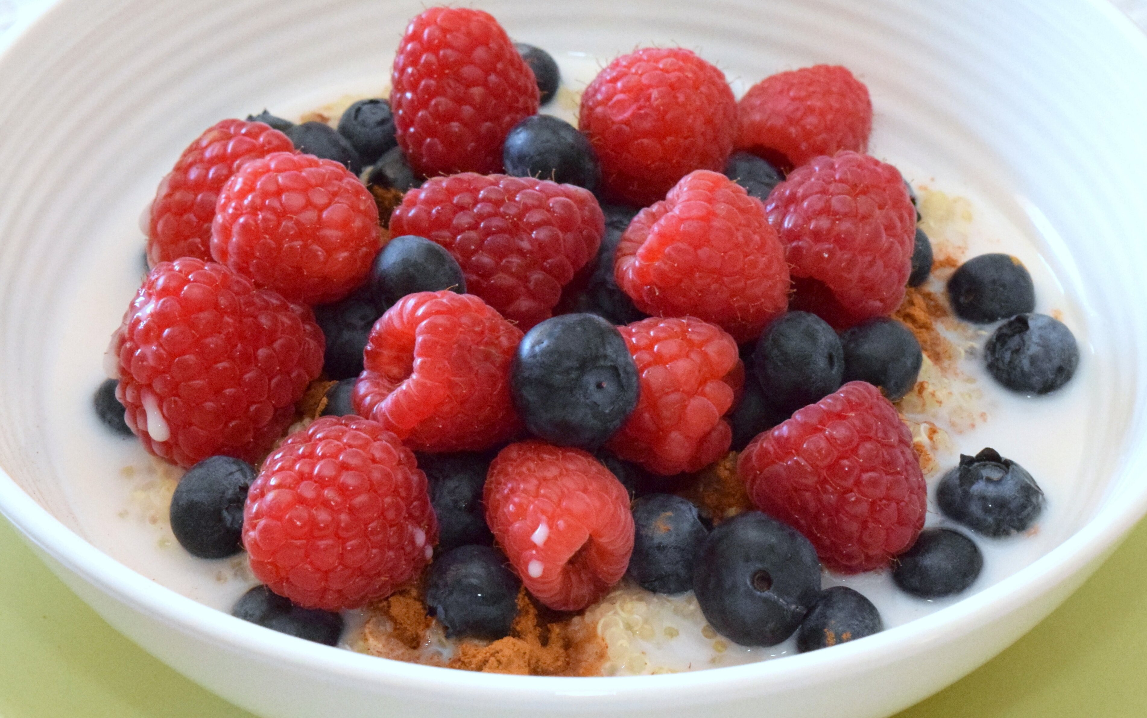 Citrus-Infused Quinoa Breakfast Bowl with Berries