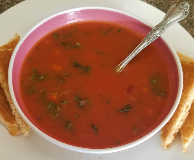 Tomato & Kale Soup with Herb Garnish