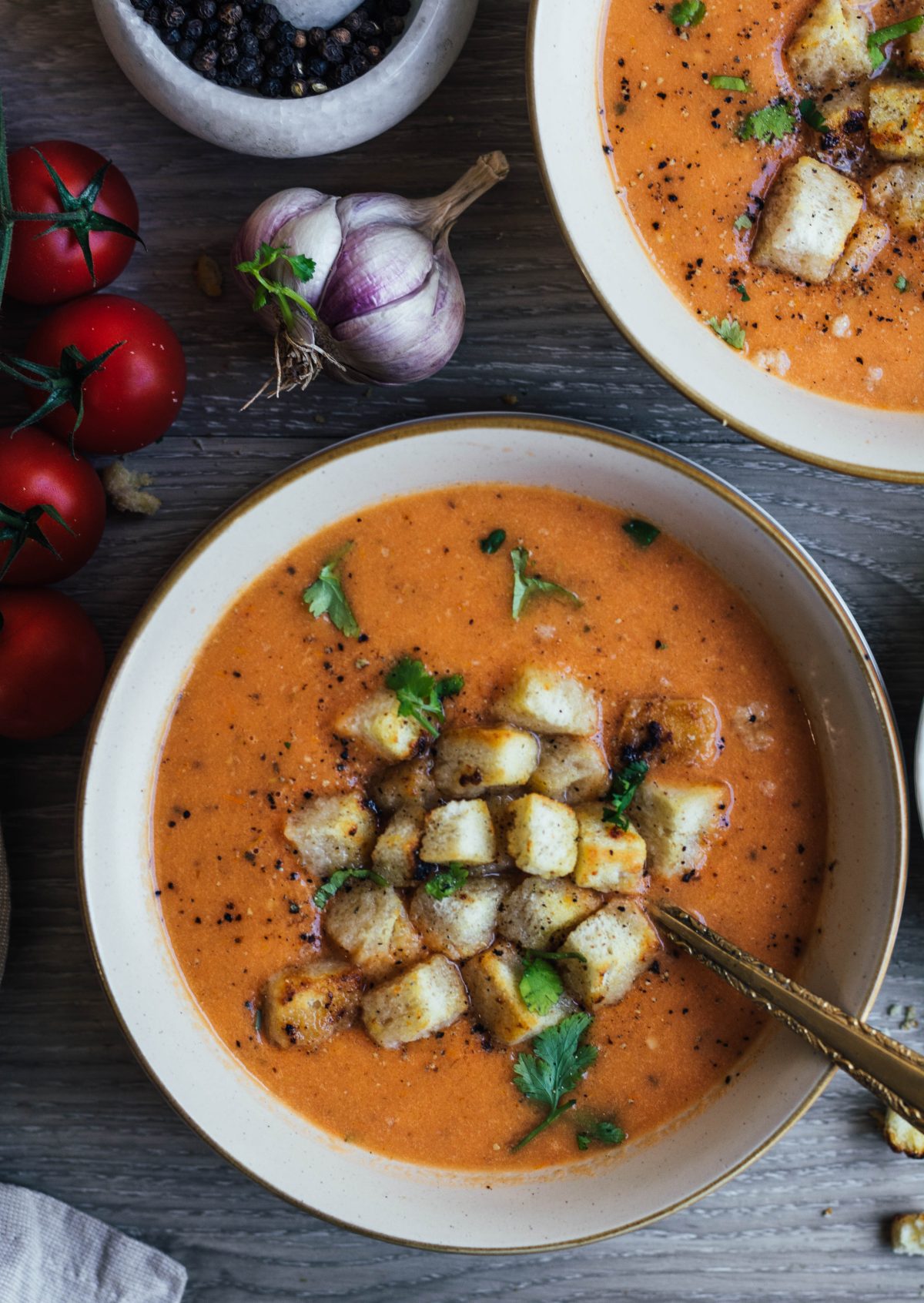 Herb-Infused Tomato Soup with Crispy Garlic Croutons