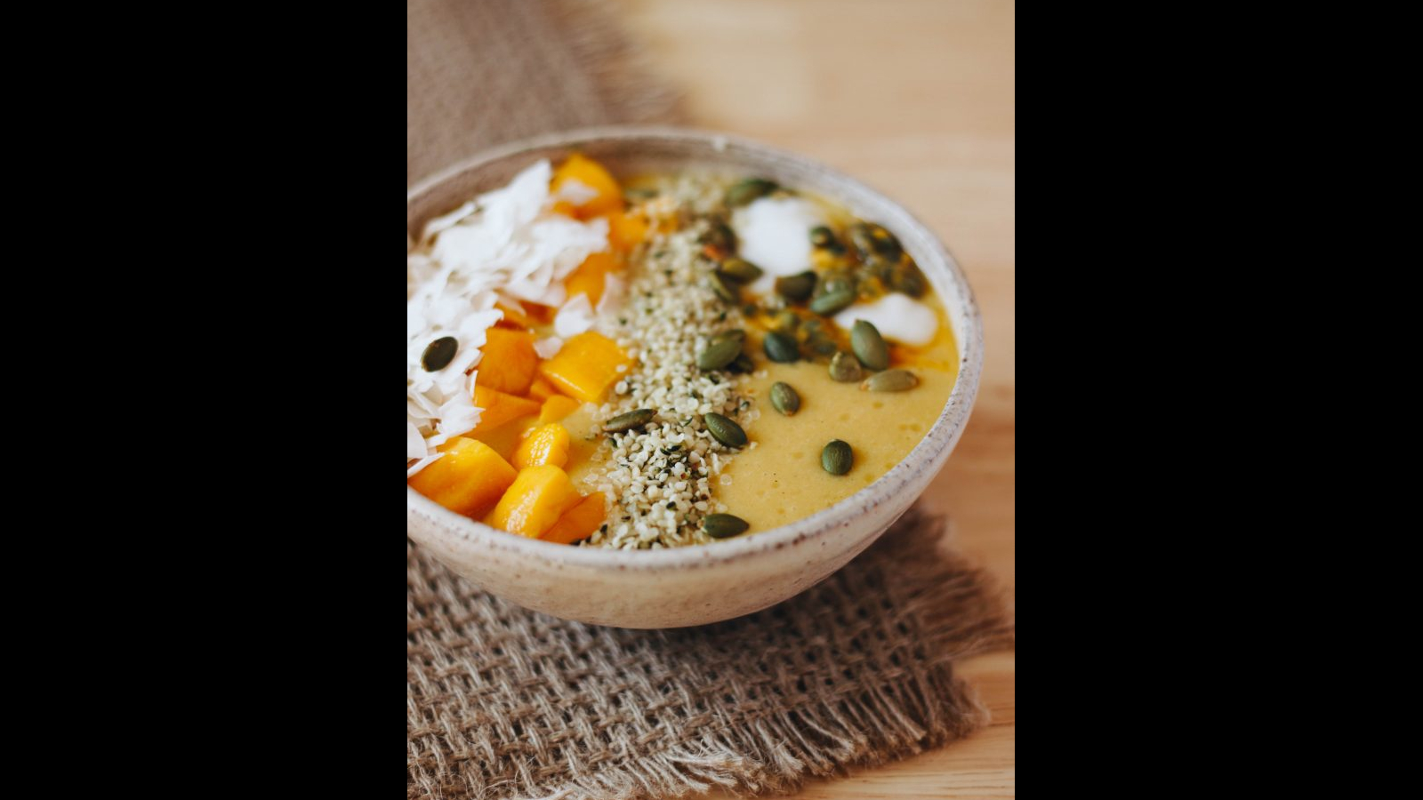 Mango-Passionfruit Smoothie Bowl with Coconut Crumble