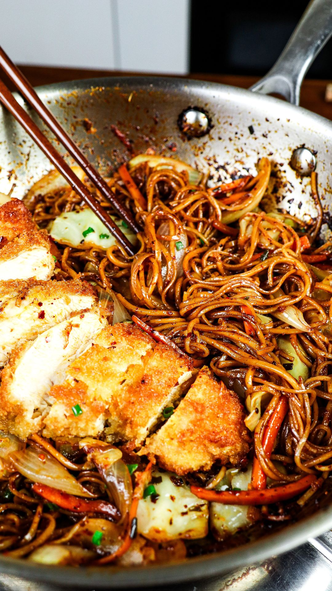 Stir-Fried Chicken and Vegetable Medley with Rice Noodles