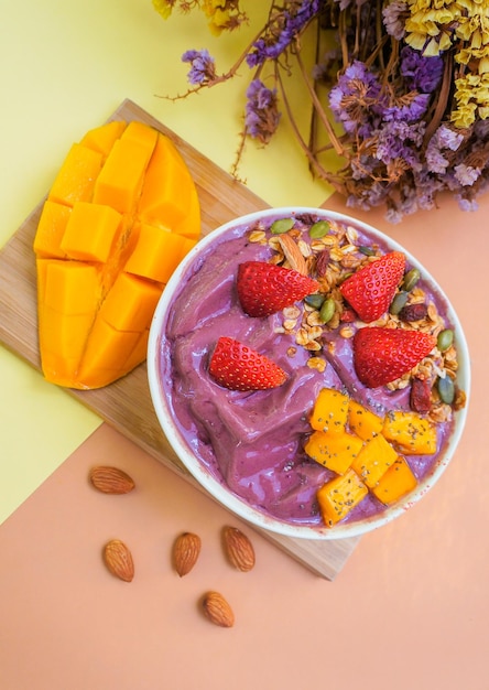 Acai Berry Smoothie Bowl with Mango and Granola