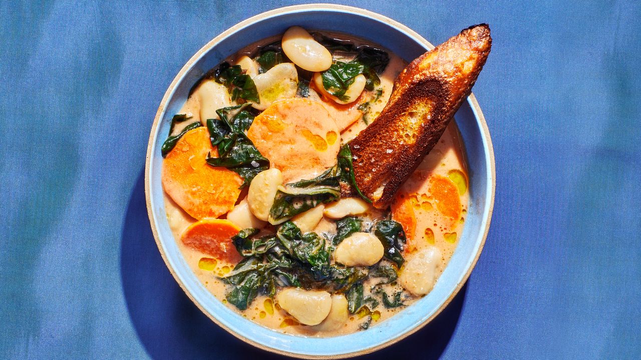 Palm Oil-Infused Bean Stew with Collard Greens