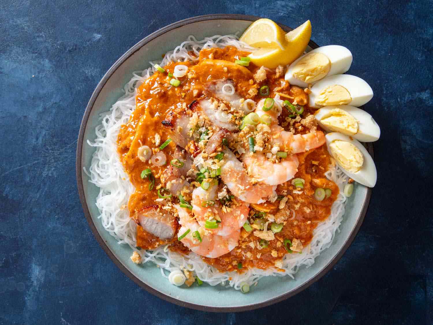 Stir-Fried Shrimp Pancit Palabok with Tomato and Garlic