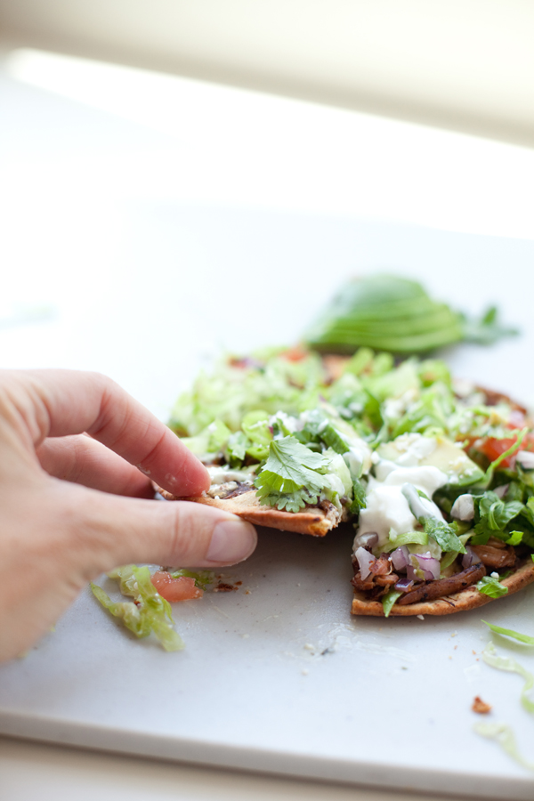 Crispy Carnitas Tostada with Avocado Crema