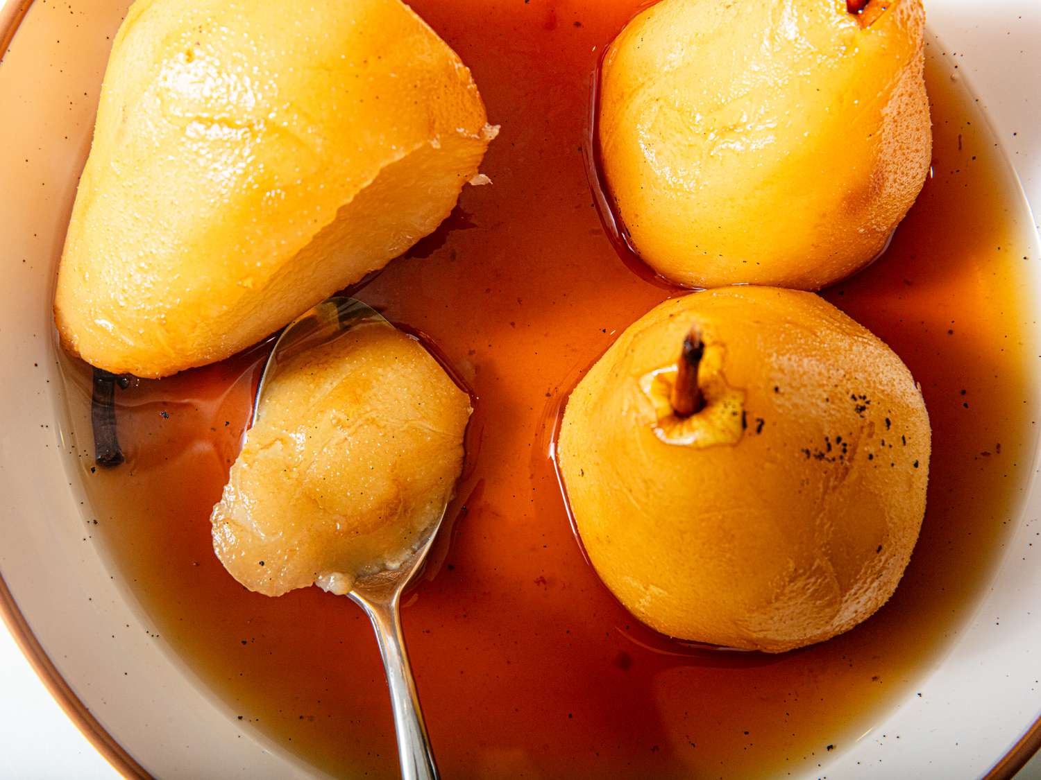 White Tea-Poached Pears with Honey and Almonds