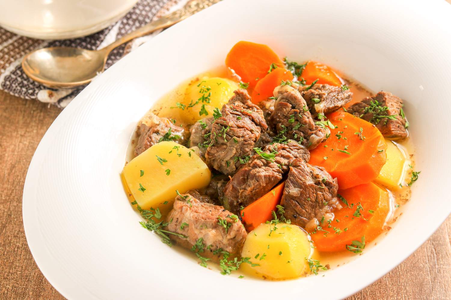 Slow-Cooked Lamb with Apricots and Almonds