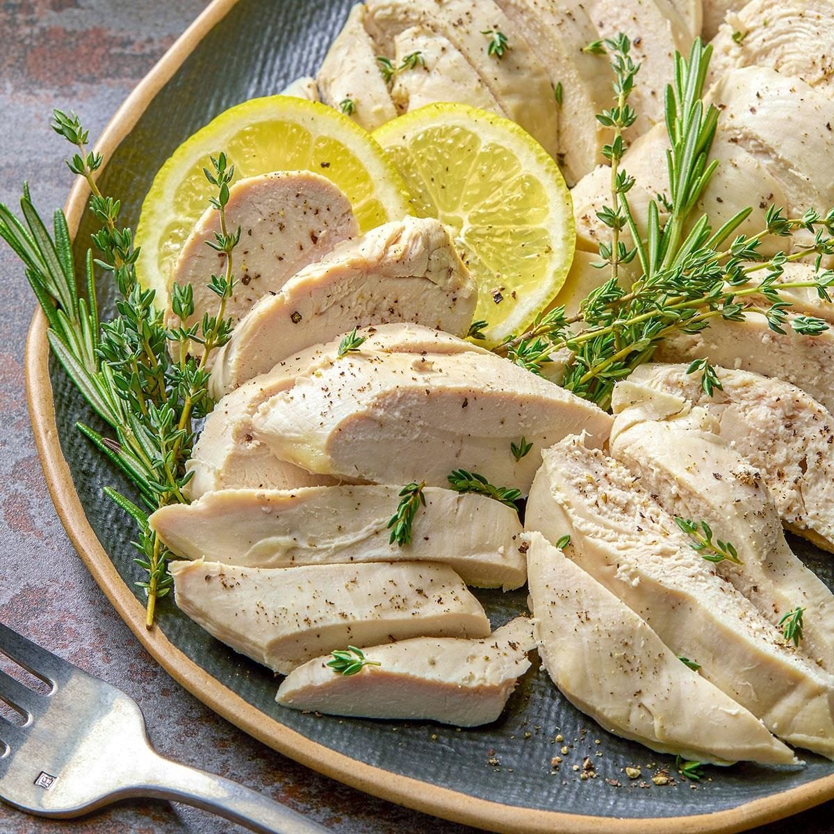 Poached Chicken Breast in Herb-Infused Broth