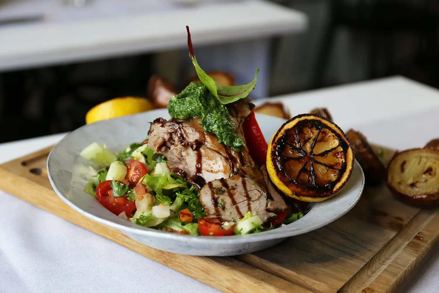Crisp-Skinned Smoked Pork Collar with Peach Glaze