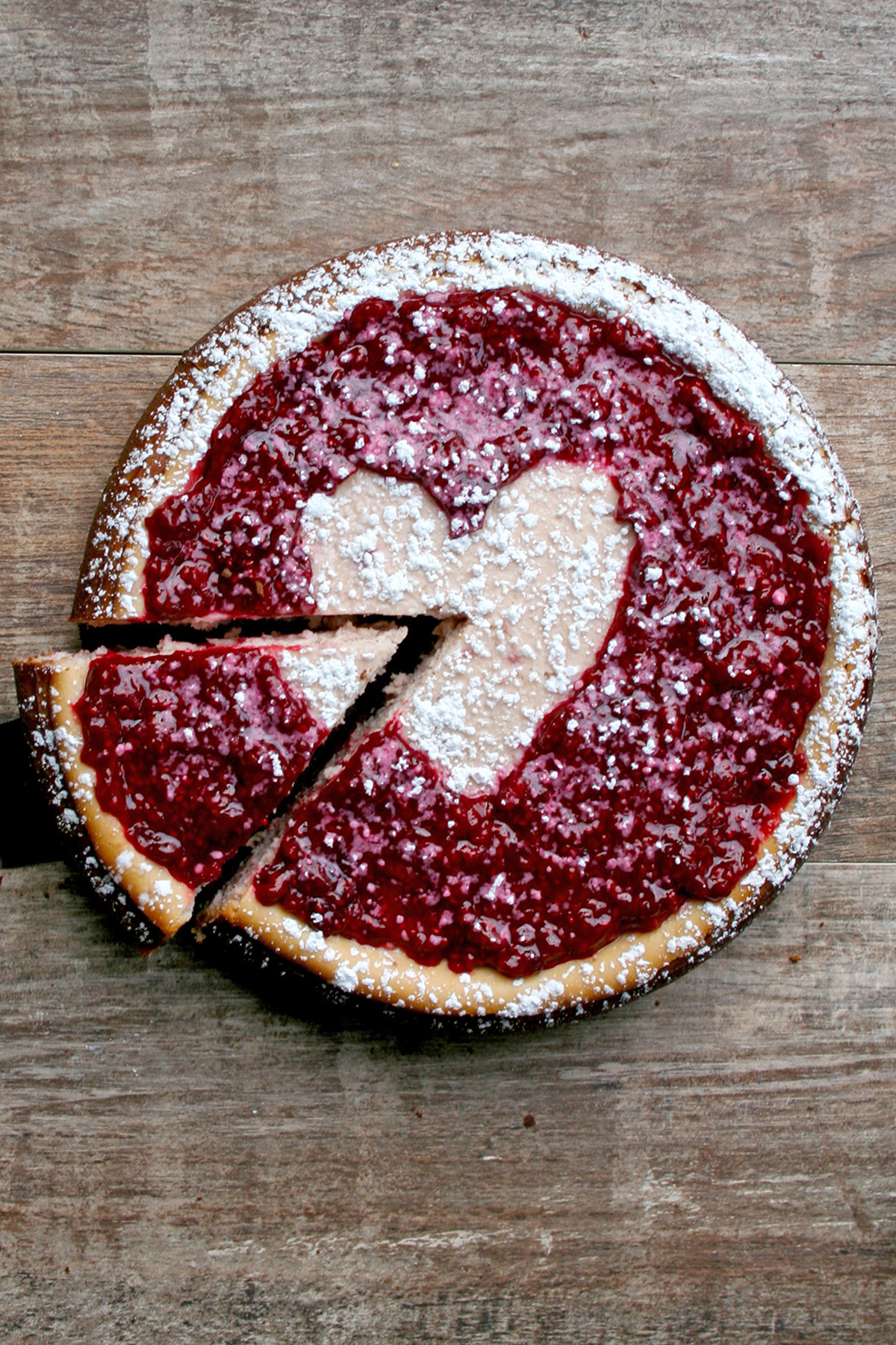 French Chocolate Olive Oil Tart with Raspberry Coulis