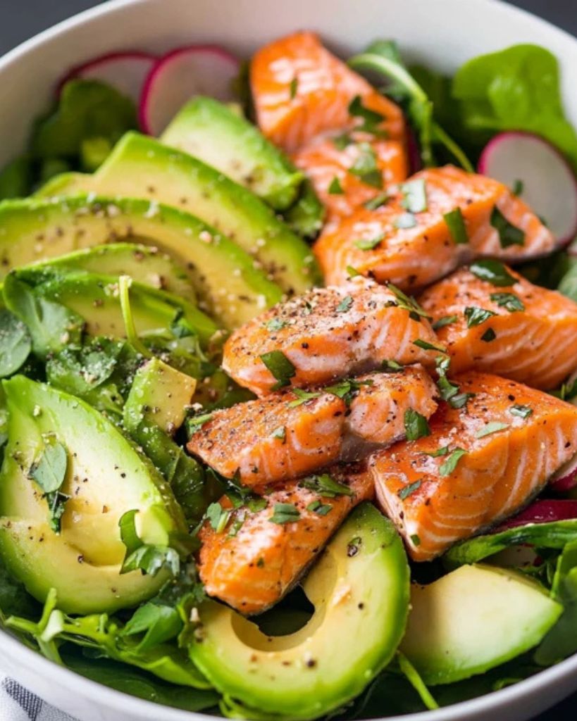 Sautéed Salmon with Garlic Spinach and Avocado Salad