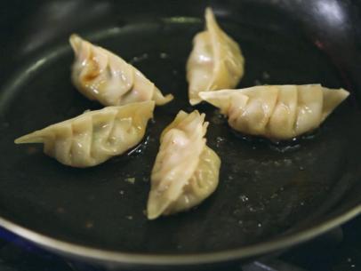 Pan-Fried Pork Dumplings with Ginger Soy Dipping Sauce