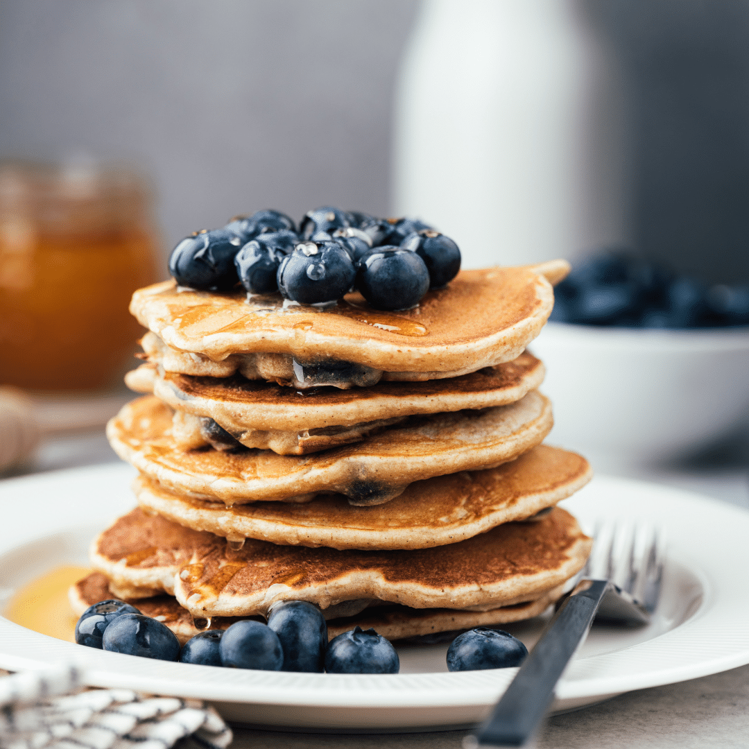 Sweet Ricotta Pancakes with Fresh Berries and Maple Syrup