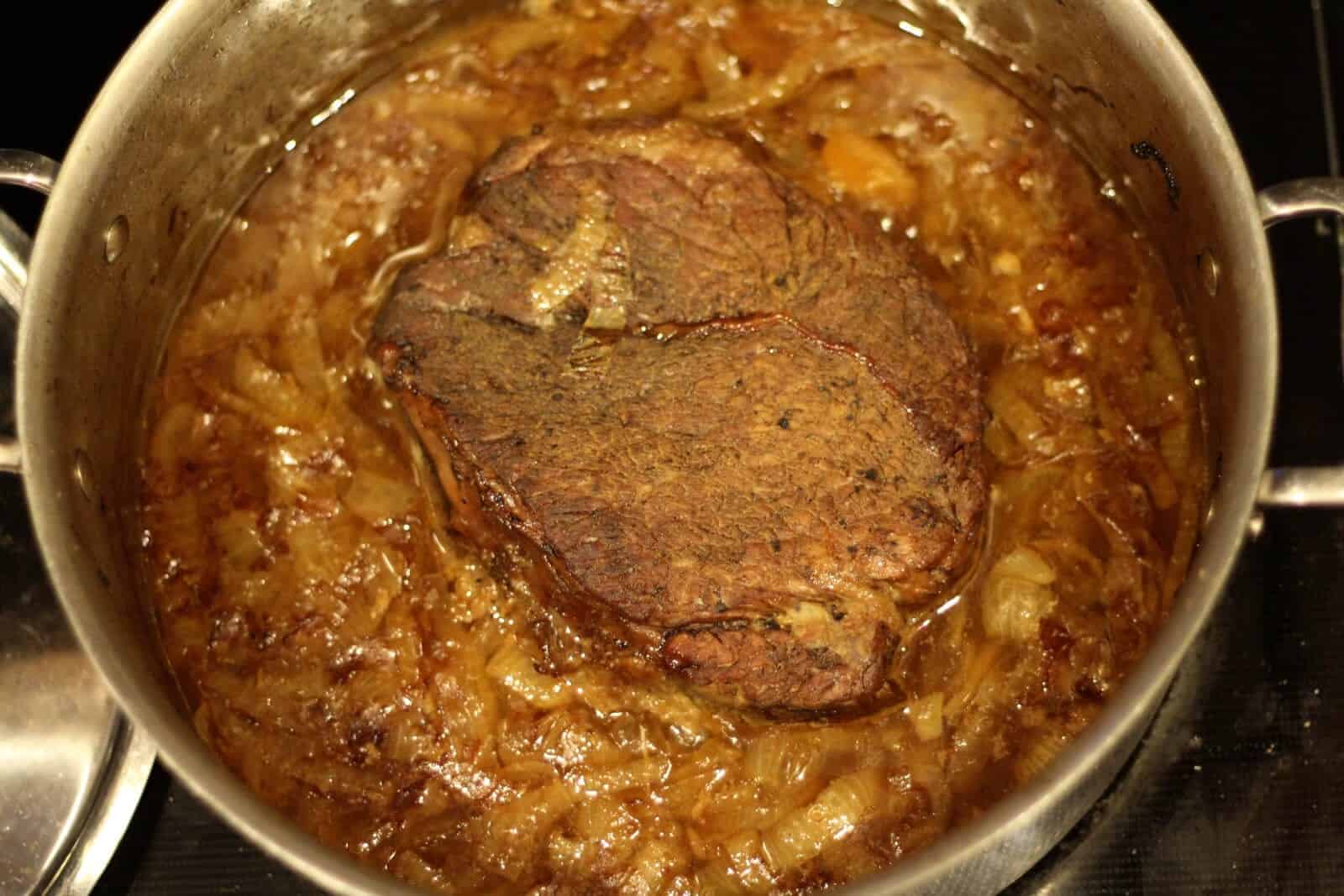 English Bitter Beer-Braised Beef with Fuggles and Caramelized Onions