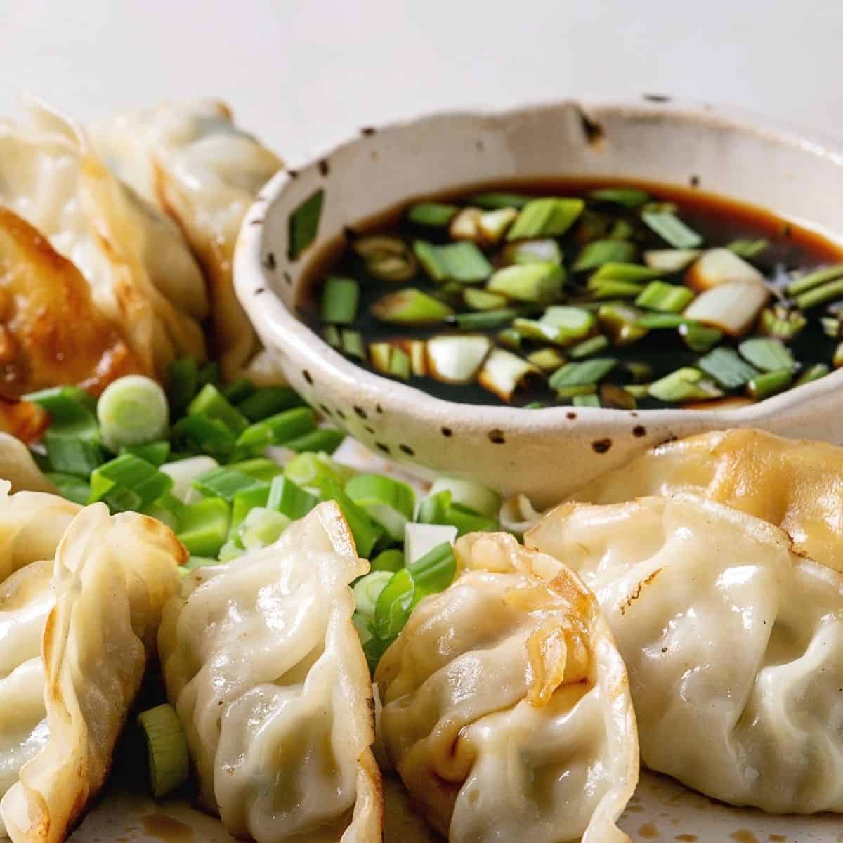 Pan-Fried Gyoza with Garlic Chive Dipping Sauce